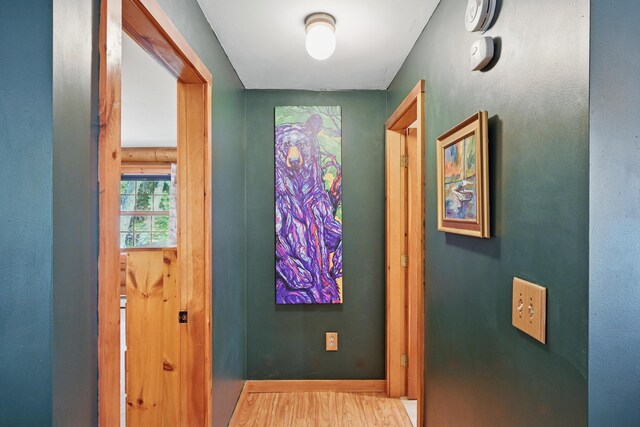 370 Point Rd, Belgrade, ME 04917 - hall with baseboards and wood finished floors
