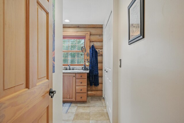 370 Point Rd, Belgrade, ME 04917 - interior space featuring recessed lighting, a sink, and log walls