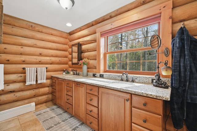 370 Point Rd, Belgrade, ME 04917 - full bath featuring double vanity, log walls, a sink, and tile patterned flooring