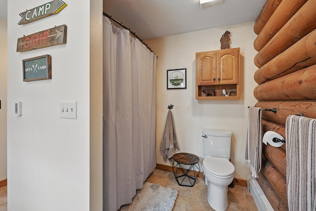 370 Point Rd, Belgrade, ME 04917 - bathroom featuring baseboards, tile patterned flooring, and toilet