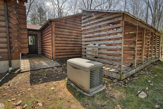 370 Point Rd, Belgrade, ME 04917 - exterior space with a downspout, a power unit, and gutters
