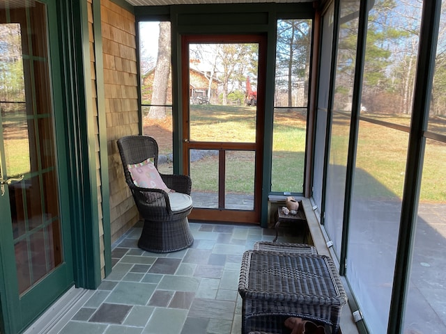 sunroom with plenty of natural light