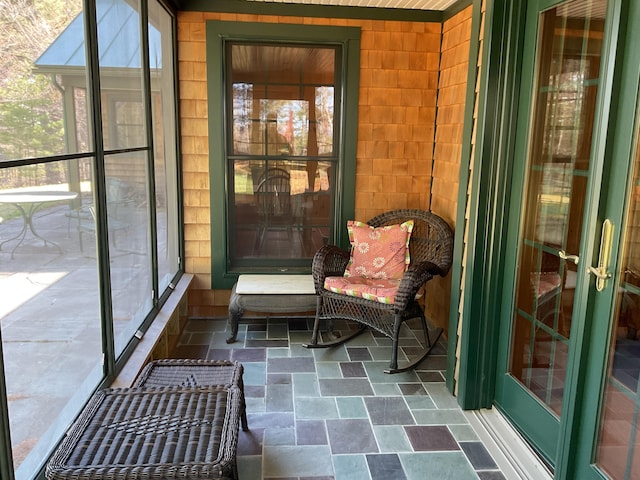 sunroom featuring plenty of natural light