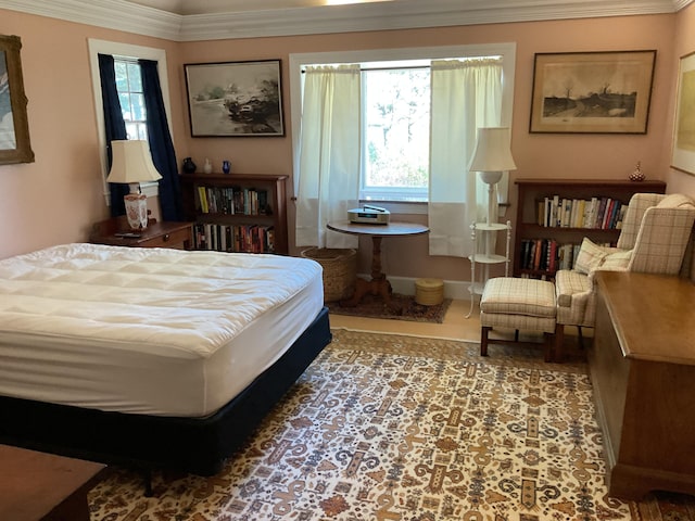 bedroom featuring ornamental molding
