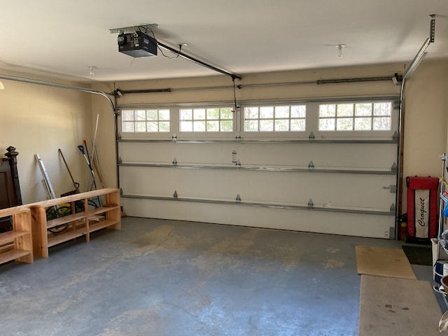 garage featuring a garage door opener