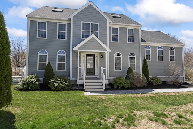 36 Fort Hill Ave, York, ME 03909 - colonial inspired home with a shingled roof and a front yard