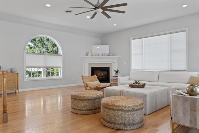 36 Fort Hill Ave, York, ME 03909 - living area featuring ceiling fan, baseboards, a glass covered fireplace, light wood-style floors, and recessed lighting