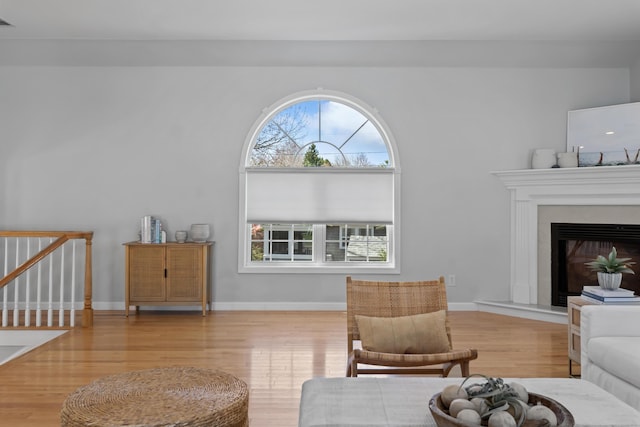36 Fort Hill Ave, York, ME 03909 - living room featuring stairs, baseboards, a glass covered fireplace, and wood finished floors