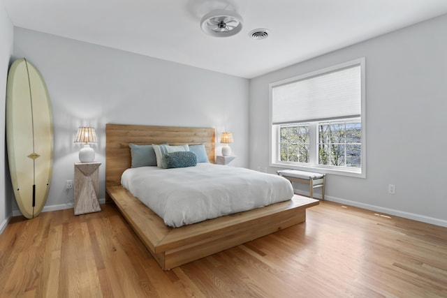36 Fort Hill Ave, York, ME 03909 - bedroom with baseboards, visible vents, and light wood-type flooring