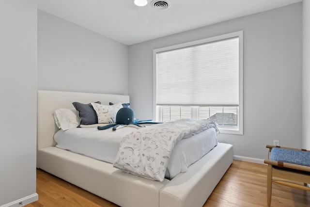 36 Fort Hill Ave, York, ME 03909 - bedroom featuring visible vents, baseboards, and wood finished floors