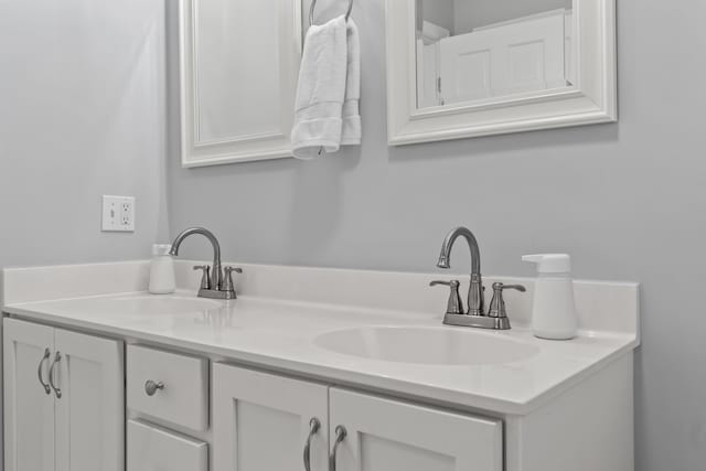 36 Fort Hill Ave, York, ME 03909 - bathroom featuring a sink and double vanity