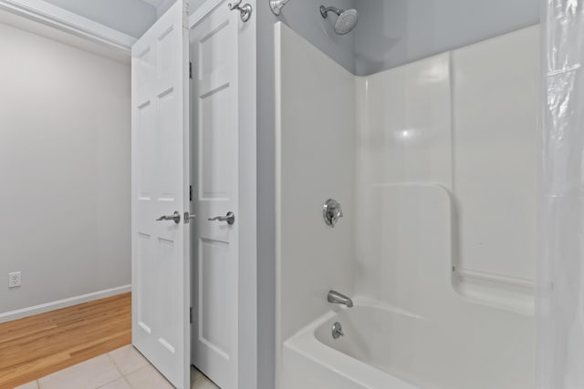 36 Fort Hill Ave, York, ME 03909 - bathroom with shower / bath combination, baseboards, and tile patterned floors