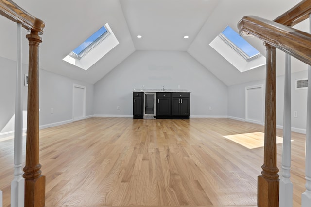 36 Fort Hill Ave, York, ME 03909 - bonus room with baseboards, visible vents, light wood finished floors, and vaulted ceiling with skylight
