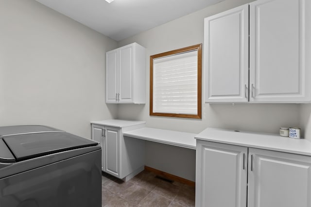 36 Fort Hill Ave, York, ME 03909 - clothes washing area featuring washer / clothes dryer, baseboards, and cabinet space