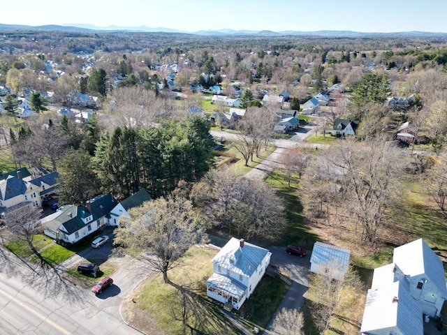 birds eye view of property featuring a mountain view and a residential view