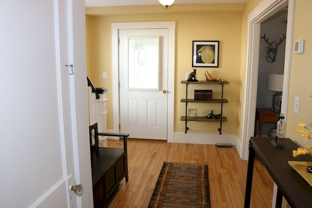 entryway featuring light wood-style floors