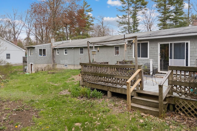 224 Branch Rd, Wells, ME 04090 - rear view of house with a deck and a yard