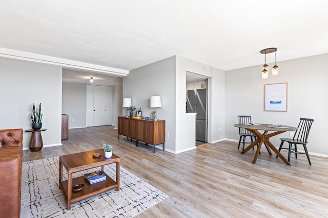 45 Eastern Promenade Unit 1E, Portland, ME 04101 - living area with light wood-style floors and baseboards