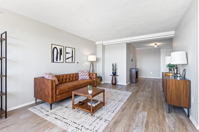 45 Eastern Promenade Unit 1E, Portland, ME 04101 - living area featuring baseboards and wood finished floors