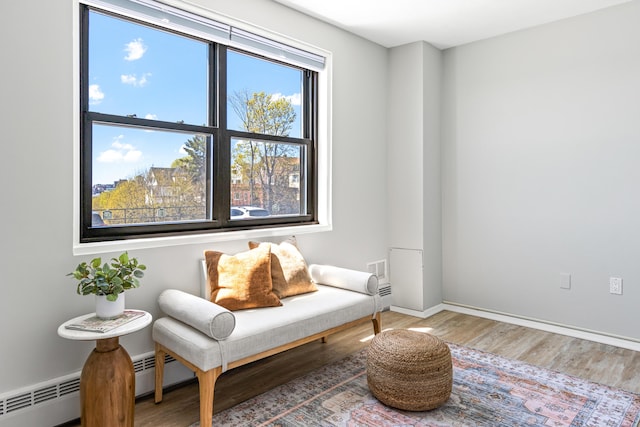 45 Eastern Promenade Unit 1E, Portland, ME 04101 - sitting room with baseboards and wood finished floors