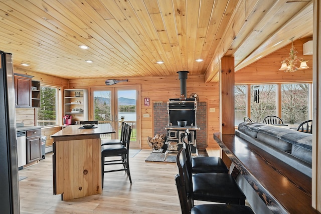 17 Kokadjo N Rd, Frenchtown Twp, ME 04441 - kitchen with recessed lighting, a center island, wood ceiling, a kitchen breakfast bar, and open shelves