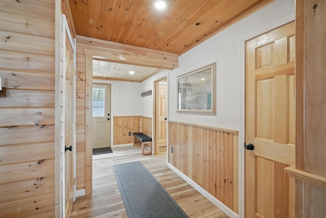 17 Kokadjo N Rd, Frenchtown Twp, ME 04441 - corridor with wainscoting, wooden ceiling, light wood-style flooring, wood walls, and recessed lighting