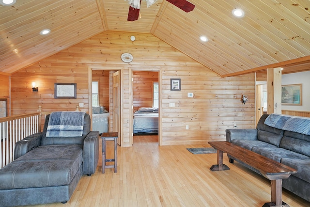 17 Kokadjo N Rd, Frenchtown Twp, ME 04441 - living room featuring vaulted ceiling, wood ceiling, a ceiling fan, wood walls, and recessed lighting