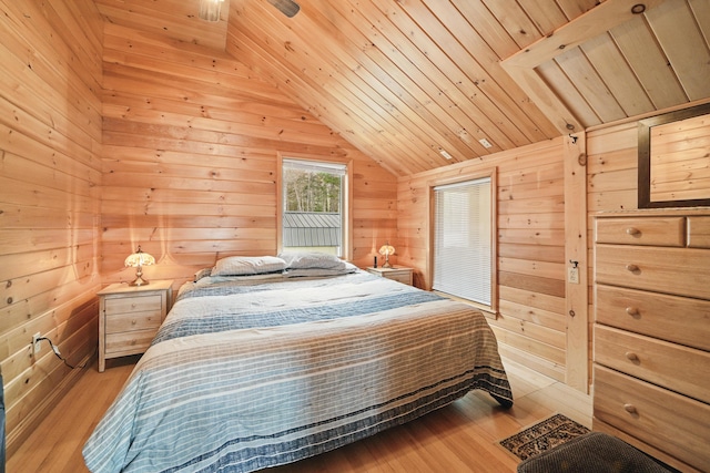 17 Kokadjo N Rd, Frenchtown Twp, ME 04441 - bedroom with wood walls, vaulted ceiling, wooden ceiling, and wood finished floors