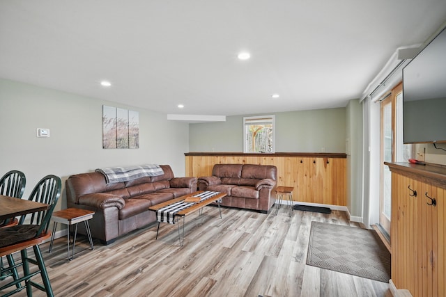 17 Kokadjo N Rd, Frenchtown Twp, ME 04441 - living area with light wood-type flooring, recessed lighting, wainscoting, and wooden walls