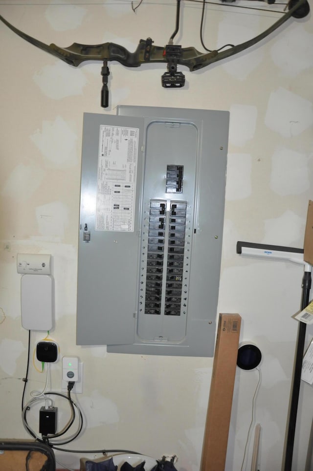 utility room featuring electric panel