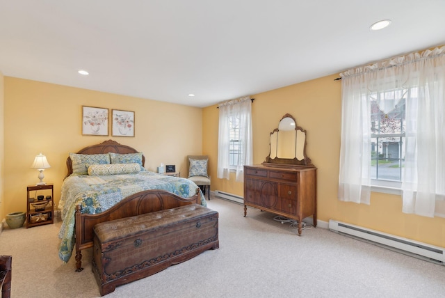 66 Colonial Vlg Unit 66, Falmouth, ME 04105 - bedroom with a baseboard heating unit, carpet flooring, and recessed lighting
