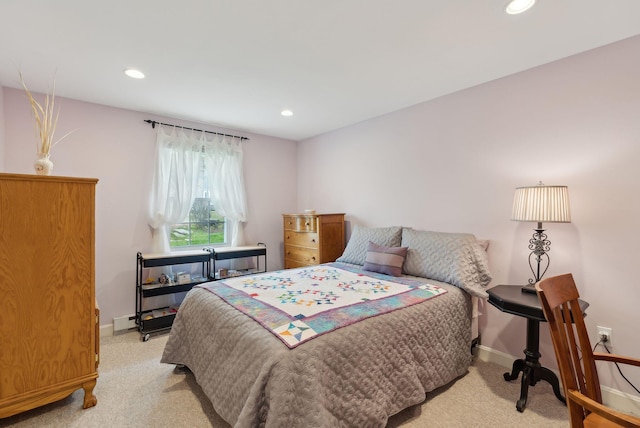 66 Colonial Vlg Unit 66, Falmouth, ME 04105 - bedroom with light carpet, baseboards, and recessed lighting