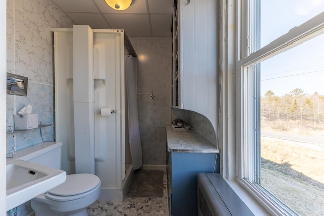 1357 Indian River Rd, Addison, ME 04606 - bathroom with healthy amount of natural light, toilet, and a paneled ceiling