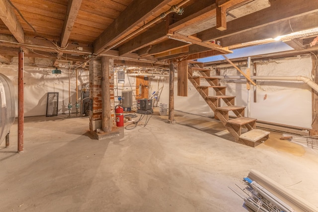 1357 Indian River Rd, Addison, ME 04606 - unfinished basement featuring a water pressure tank