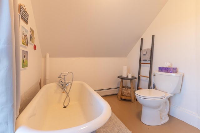 1357 Indian River Rd, Addison, ME 04606 - full bathroom featuring toilet, a freestanding tub, a baseboard radiator, and vaulted ceiling
