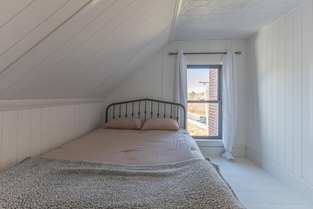 1357 Indian River Rd, Addison, ME 04606 - bedroom featuring vaulted ceiling and wooden walls