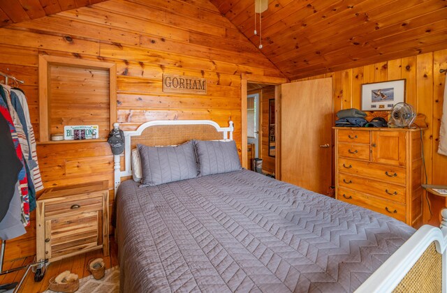 114 Smith Rd, Hudson, ME 04449 - bedroom with vaulted ceiling, wooden walls, and wooden ceiling