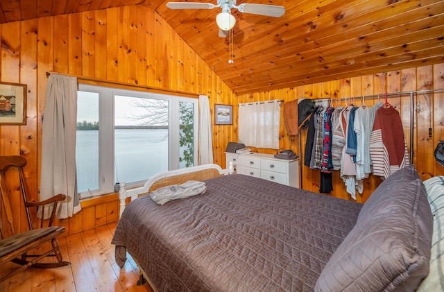 114 Smith Rd, Hudson, ME 04449 - bedroom with vaulted ceiling, wood walls, hardwood / wood-style flooring, wooden ceiling, and ceiling fan