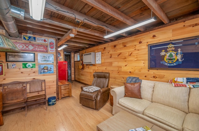 114 Smith Rd, Hudson, ME 04449 - living area with wooden walls, wood finished floors, beamed ceiling, and wooden ceiling