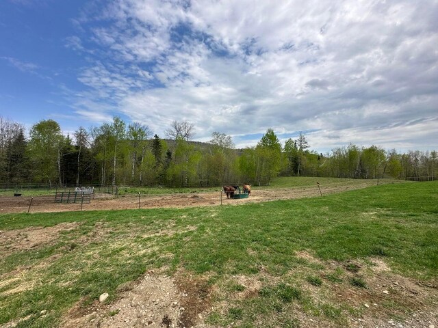 153 Spaulding Lake Rd, Oakfield, ME 04763 - view of yard featuring fence, a rural view, and a forest view