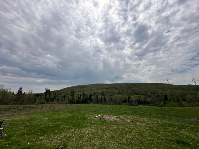 153 Spaulding Lake Rd, Oakfield, ME 04763 - property view of mountains with a forest view and a rural view