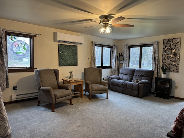 3043 W Chapman Rd, Mapleton, ME 04757 - living room featuring carpet flooring, a wood stove, a ceiling fan, a wall unit AC, and a baseboard radiator