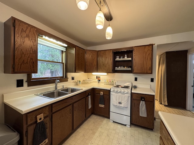 3043 W Chapman Rd, Mapleton, ME 04757 - kitchen with open shelves, light floors, light countertops, white range with electric stovetop, and a sink