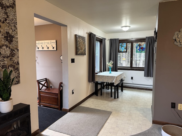 3043 W Chapman Rd, Mapleton, ME 04757 - hallway with baseboards, baseboard heating, and light floors