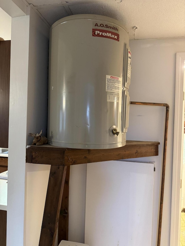 3043 W Chapman Rd, Mapleton, ME 04757 - utility room featuring water heater