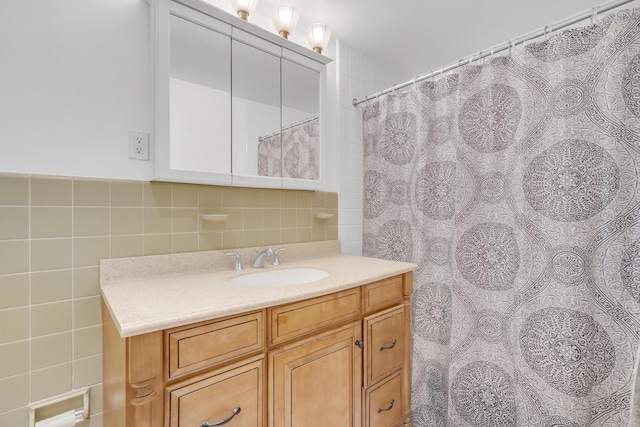 full bathroom with backsplash, tile walls, a shower with curtain, and vanity