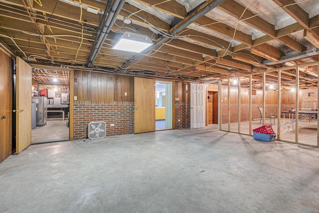 unfinished below grade area featuring washer / clothes dryer
