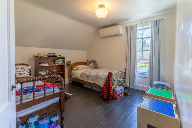 bedroom featuring an AC wall unit, dark wood-style flooring, and lofted ceiling
