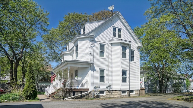 25 Nevens St Unit 1, Portland, ME 04103 - view of front of house with covered porch
