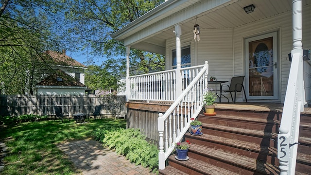 25 Nevens St Unit 1, Portland, ME 04103 - view of exterior entry with covered porch and fence